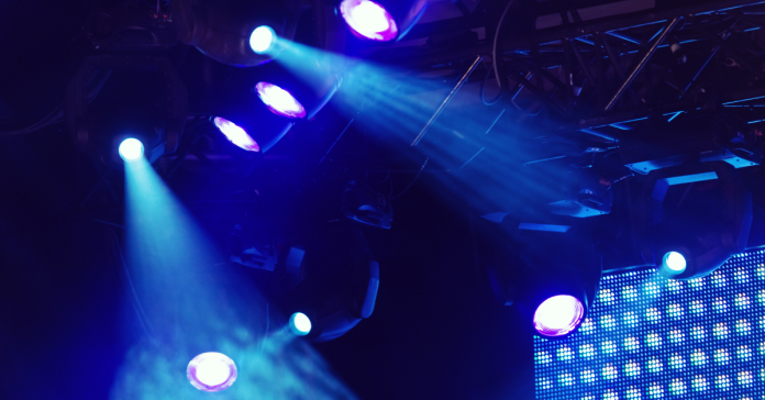 Blue stage lighting at an event venue